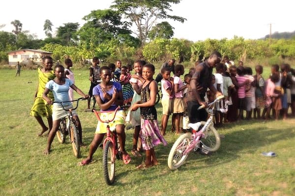 Children with donated bikes
