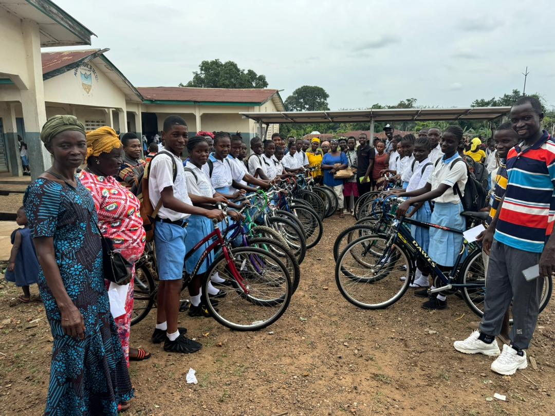 Students lined up with their new bicycles at a Sierra Leone school